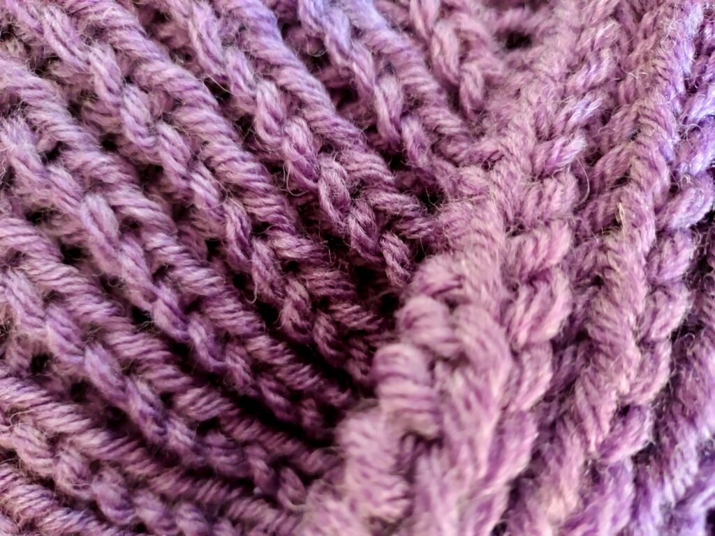 Purple Knitted Fabric Close-Up